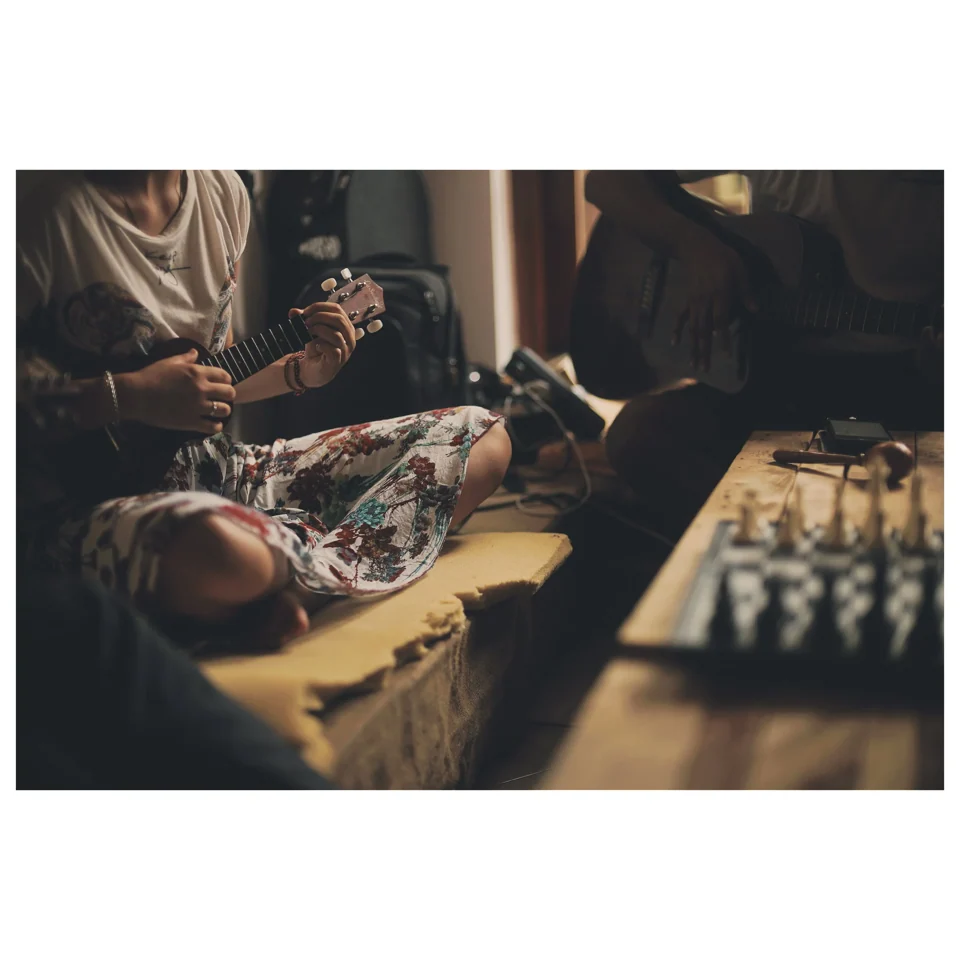 People gathered around a board game