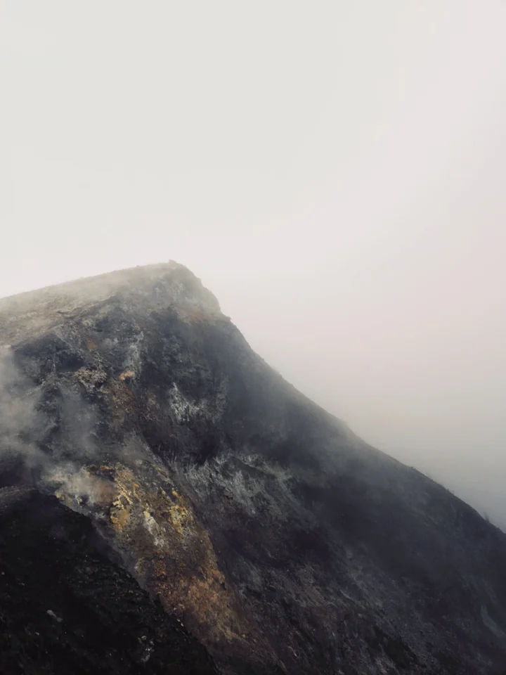 A mist-covered mountain summit
