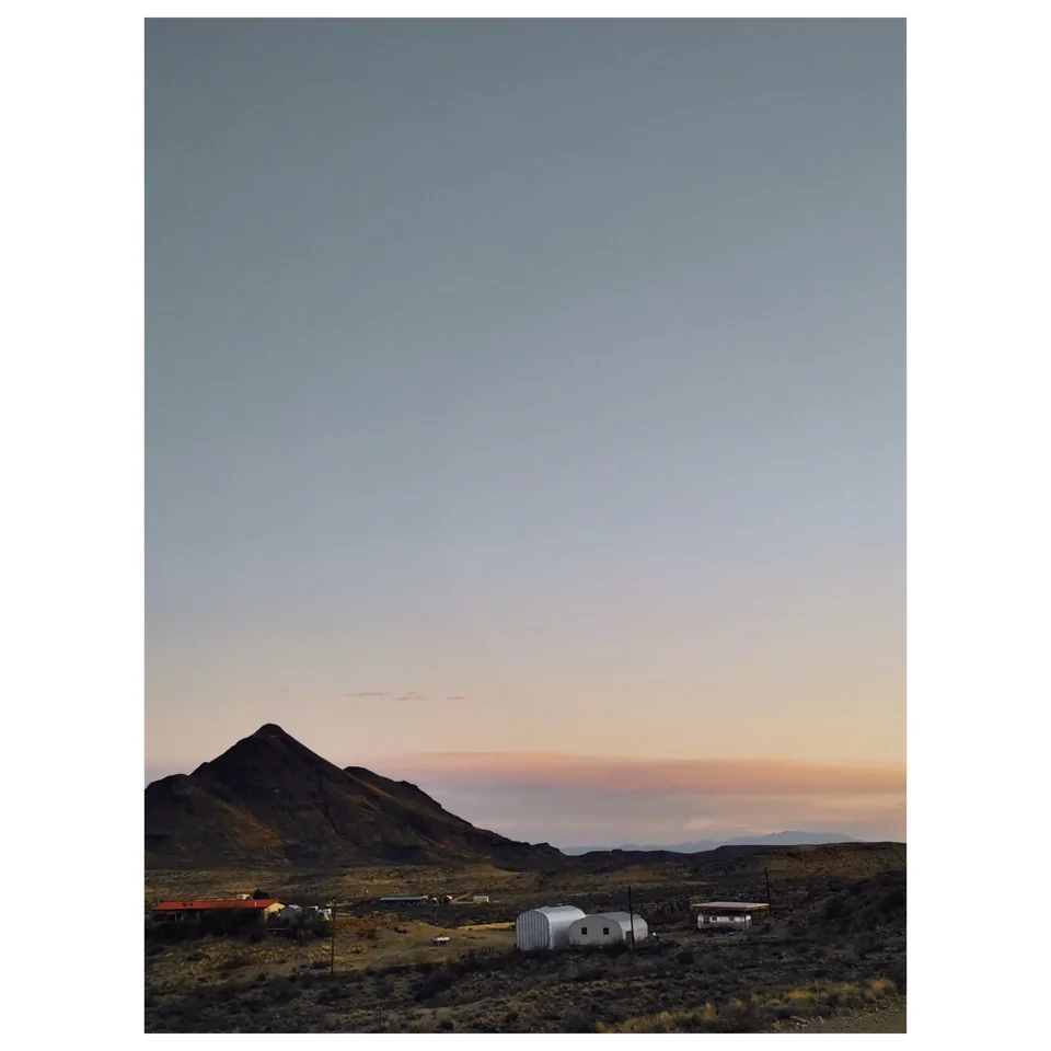 A mountain beneath an open sky