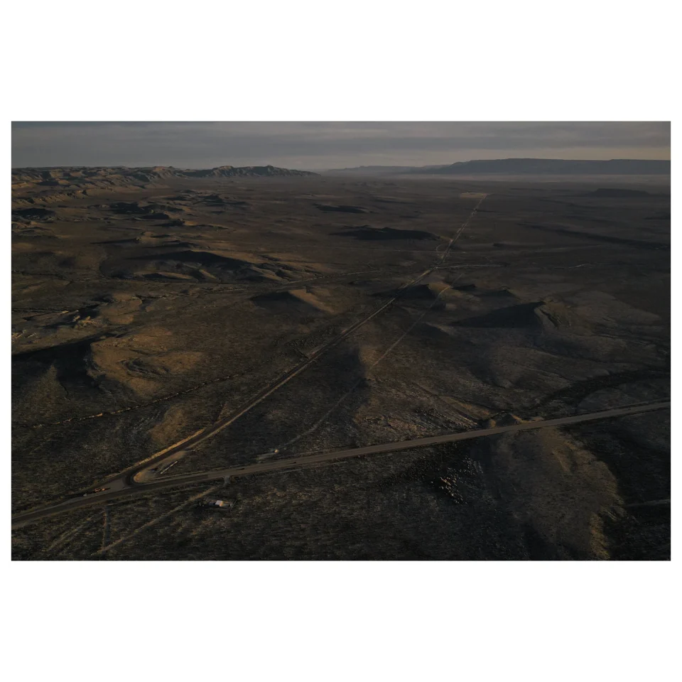 Desert ridges and distant mountains