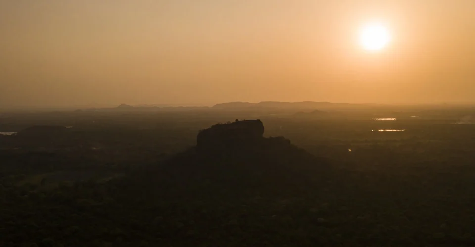 A low sun over a hazy landscape