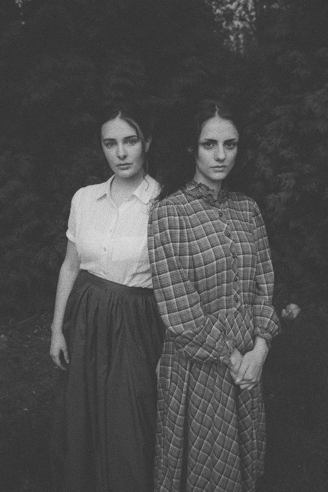Black-and-white portrait of two women