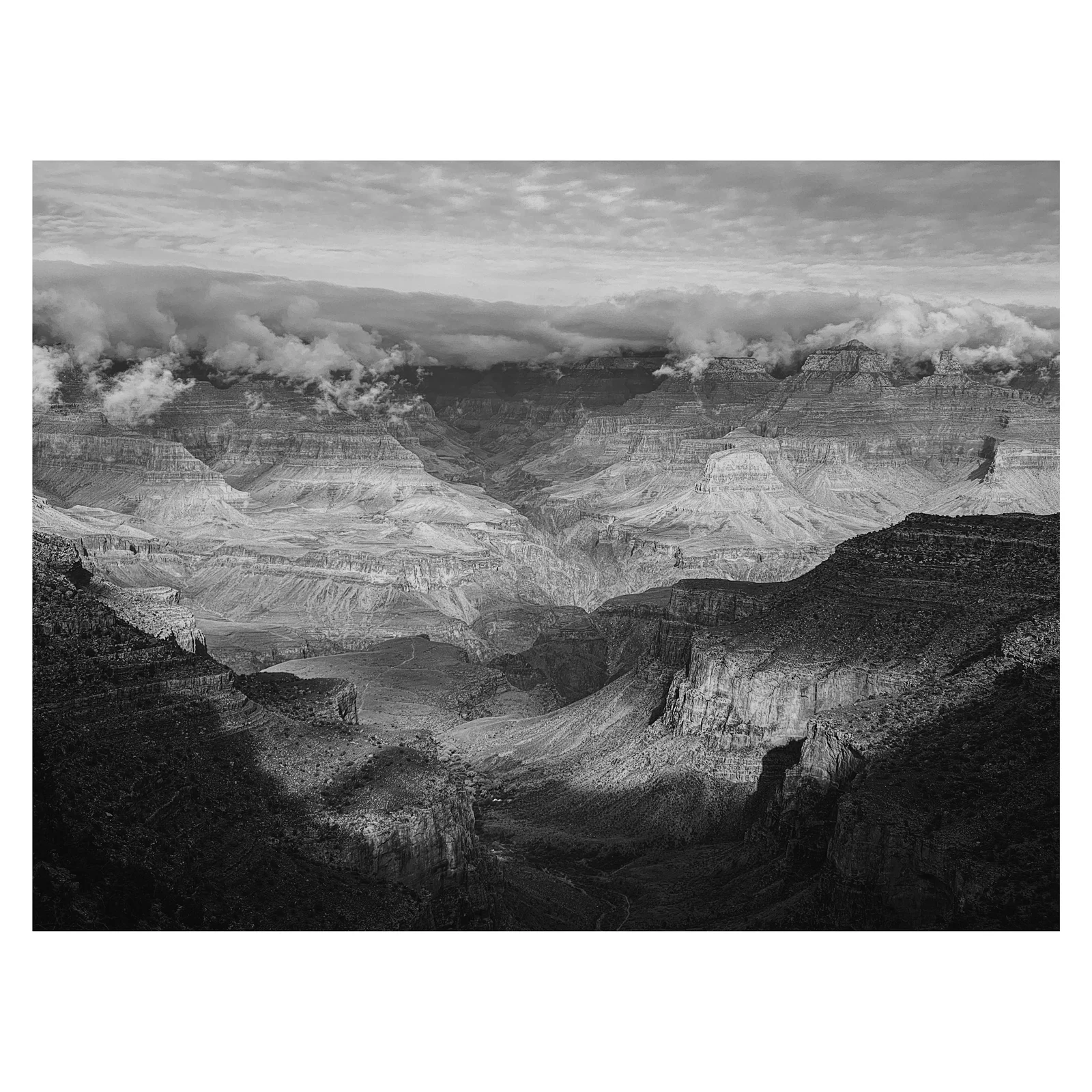 Black-and-white mountain and canyon layers